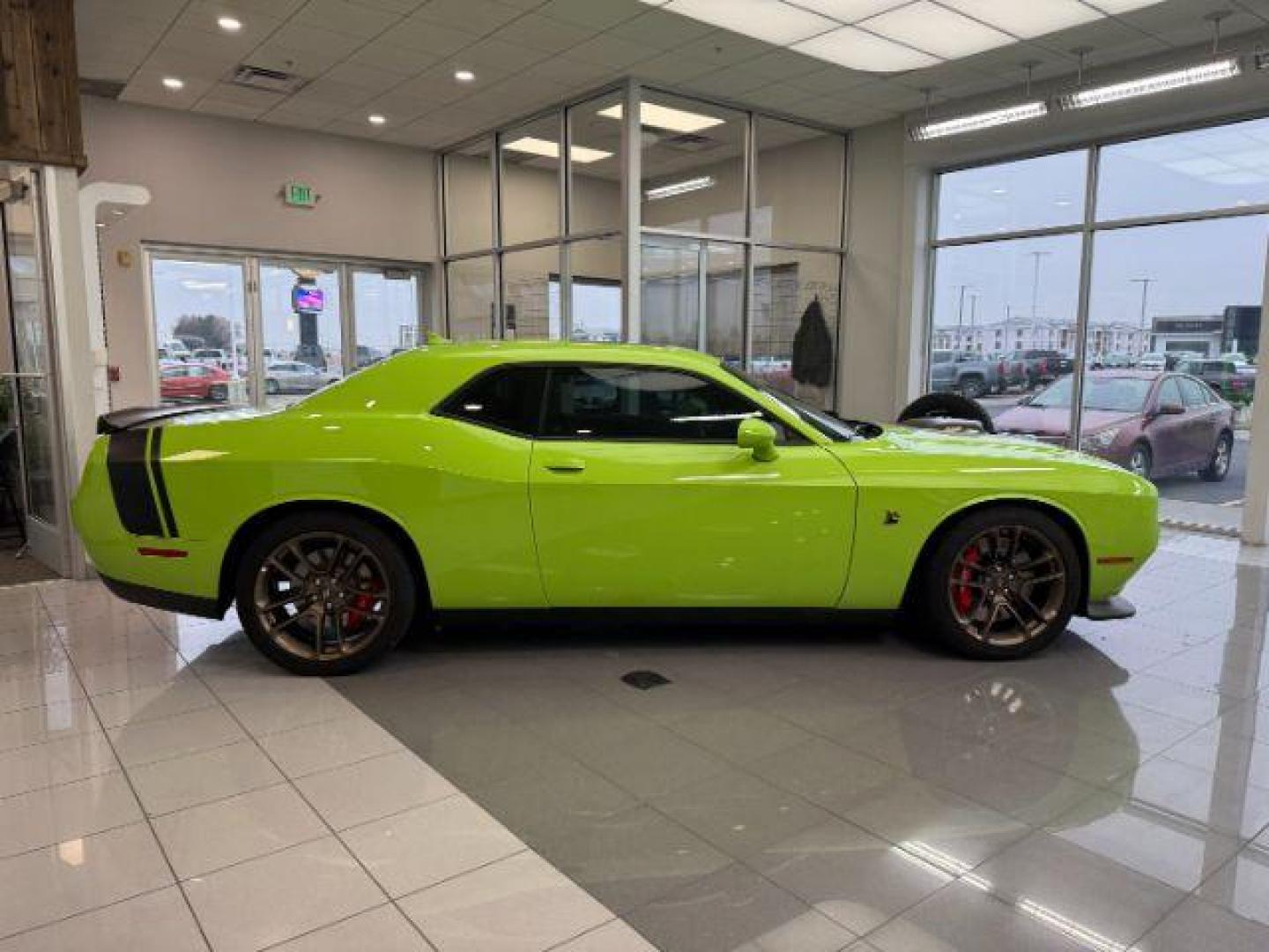 2023 GREEN /Black Dodge Challenger (2C3CDZFJ1PH) with an HEMI 64L V-8 premium unleaded engine, Automatic transmission, located at 1175 N Woodruff Ave, Idaho Falls, ID, 83401, 43.506901, -111.999657 - At Timberline Auto, finding a great deal on your next vehicle is always easy! Our experienced sales staff's goal is to help find you the right vehicle at the right price! Our knowledgeable finance department has options for almost any credit score. We offer extended service contract options to prote - Photo#27