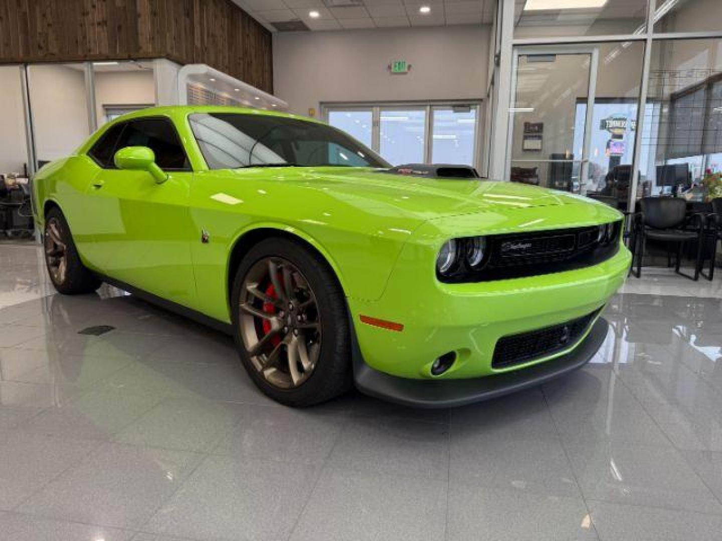 2023 GREEN /Black Dodge Challenger (2C3CDZFJ1PH) with an HEMI 64L V-8 premium unleaded engine, Automatic transmission, located at 1175 N Woodruff Ave, Idaho Falls, ID, 83401, 43.506901, -111.999657 - At Timberline Auto, finding a great deal on your next vehicle is always easy! Our experienced sales staff's goal is to help find you the right vehicle at the right price! Our knowledgeable finance department has options for almost any credit score. We offer extended service contract options to prote - Photo#28