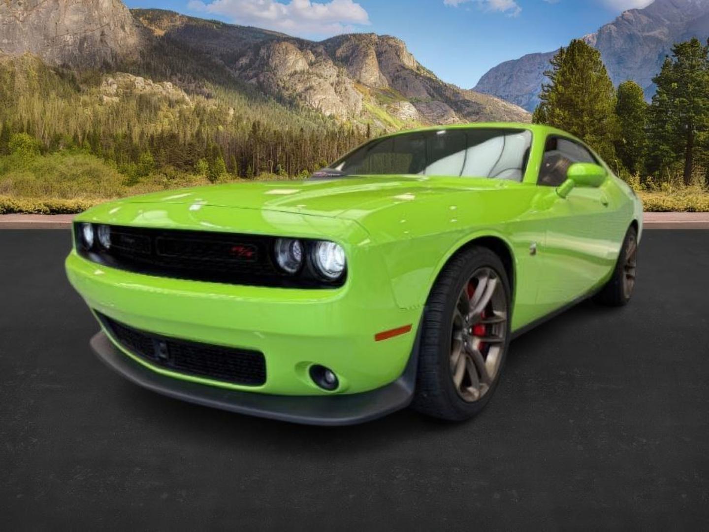 2023 GREEN /Black Dodge Challenger (2C3CDZFJ1PH) with an HEMI 64L V-8 premium unleaded engine, Automatic transmission, located at 1175 N Woodruff Ave, Idaho Falls, ID, 83401, 43.506901, -111.999657 - At Timberline Auto, finding a great deal on your next vehicle is always easy! Our experienced sales staff's goal is to help find you the right vehicle at the right price! Our knowledgeable finance department has options for almost any credit score. We offer extended service contract options to prote - Photo#0