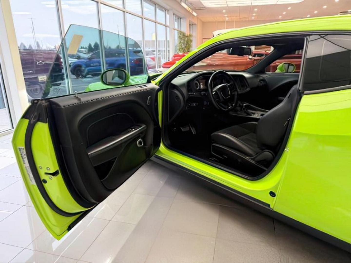 2023 GREEN /Black Dodge Challenger (2C3CDZFJ1PH) with an HEMI 64L V-8 premium unleaded engine, Automatic transmission, located at 1175 N Woodruff Ave, Idaho Falls, ID, 83401, 43.506901, -111.999657 - At Timberline Auto, finding a great deal on your next vehicle is always easy! Our experienced sales staff's goal is to help find you the right vehicle at the right price! Our knowledgeable finance department has options for almost any credit score. We offer extended service contract options to prote - Photo#11