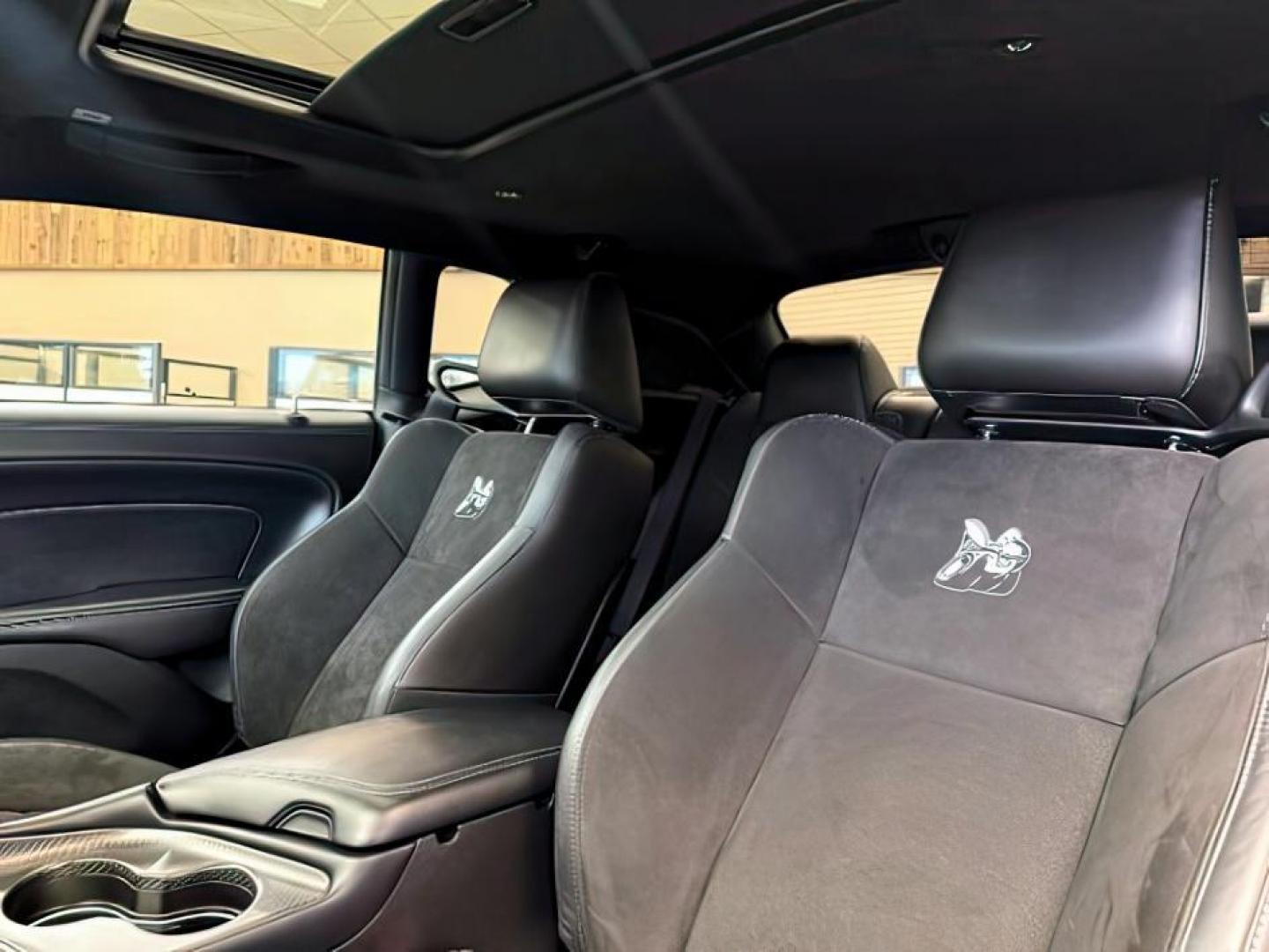 2023 GREEN /Black Dodge Challenger (2C3CDZFJ1PH) with an HEMI 64L V-8 premium unleaded engine, Automatic transmission, located at 1175 N Woodruff Ave, Idaho Falls, ID, 83401, 43.506901, -111.999657 - At Timberline Auto, finding a great deal on your next vehicle is always easy! Our experienced sales staff's goal is to help find you the right vehicle at the right price! Our knowledgeable finance department has options for almost any credit score. We offer extended service contract options to prote - Photo#17