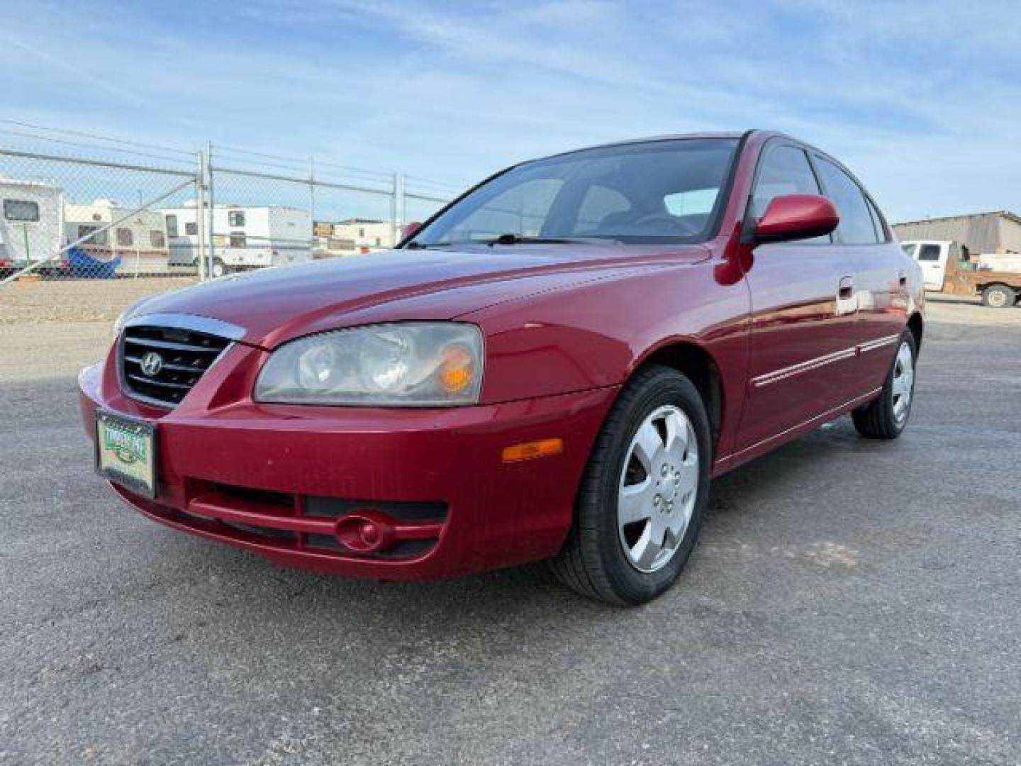 2004 RED /Gray Hyundai Elantra (KMHDN46D04U) with an 2L I-4 DOHC engine, Automatic transmission, located at 1175 N Woodruff Ave, Idaho Falls, ID, 83401, 43.506901, -111.999657 - At Timberline Auto, finding a great deal on your next vehicle is always easy! Our experienced sales staff's goal is to help find you the right vehicle at the right price! Our knowledgeable finance department has options for almost any credit score. We offer extended service contract options to prote - Photo#19