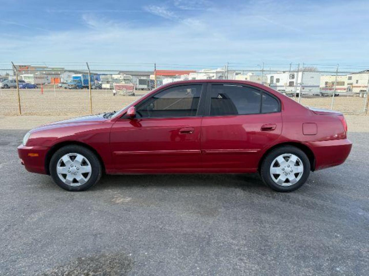 2004 RED /Gray Hyundai Elantra (KMHDN46D04U) with an 2L I-4 DOHC engine, Automatic transmission, located at 1175 N Woodruff Ave, Idaho Falls, ID, 83401, 43.506901, -111.999657 - At Timberline Auto, finding a great deal on your next vehicle is always easy! Our experienced sales staff's goal is to help find you the right vehicle at the right price! Our knowledgeable finance department has options for almost any credit score. We offer extended service contract options to prote - Photo#20