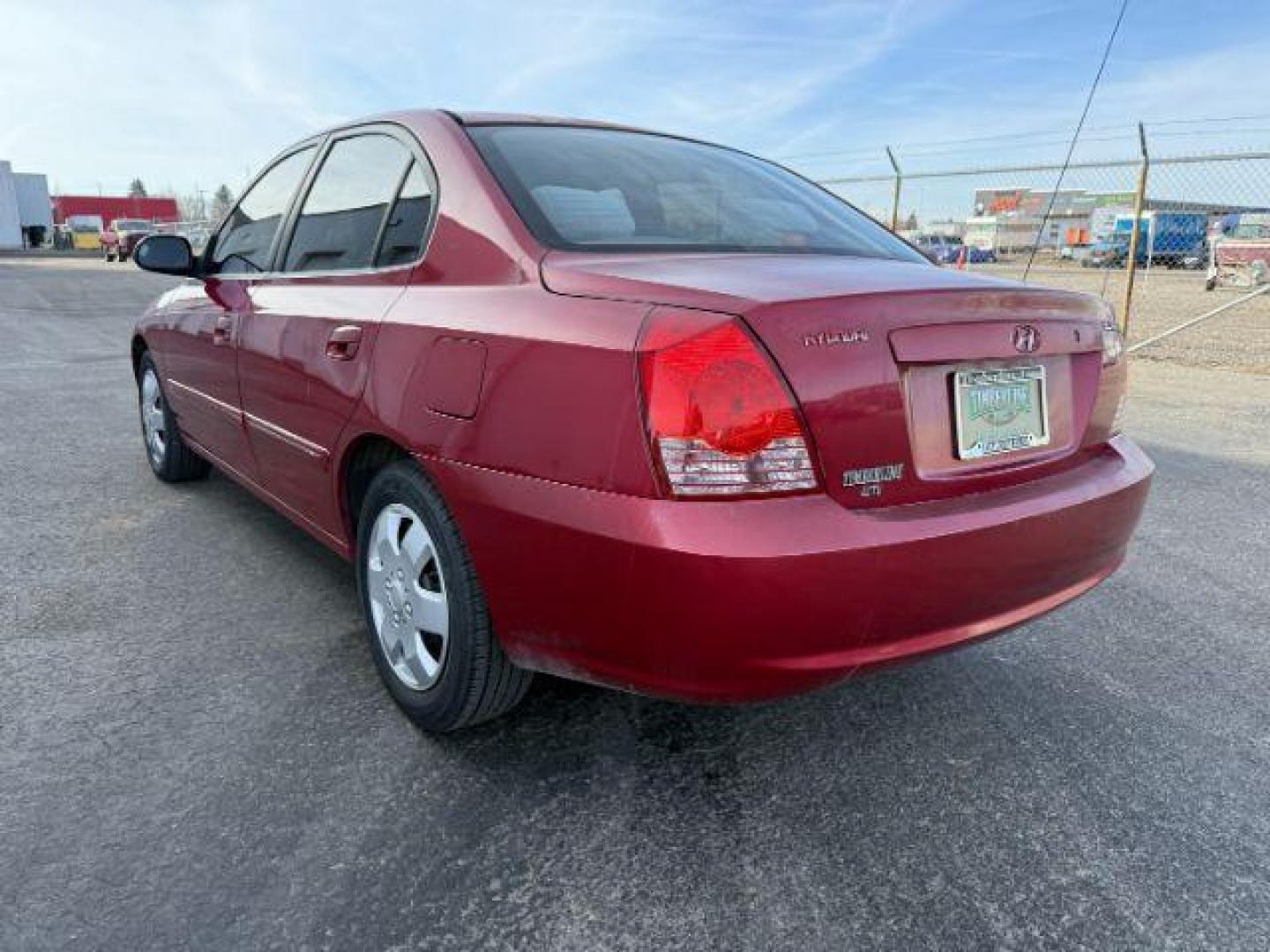 2004 RED /Gray Hyundai Elantra (KMHDN46D04U) with an 2L I-4 DOHC engine, Automatic transmission, located at 1175 N Woodruff Ave, Idaho Falls, ID, 83401, 43.506901, -111.999657 - At Timberline Auto, finding a great deal on your next vehicle is always easy! Our experienced sales staff's goal is to help find you the right vehicle at the right price! Our knowledgeable finance department has options for almost any credit score. We offer extended service contract options to prote - Photo#21