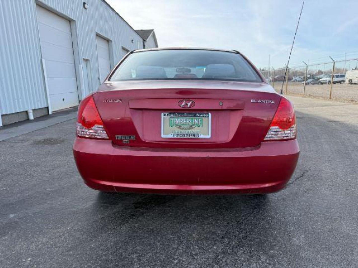 2004 RED /Gray Hyundai Elantra (KMHDN46D04U) with an 2L I-4 DOHC engine, Automatic transmission, located at 1175 N Woodruff Ave, Idaho Falls, ID, 83401, 43.506901, -111.999657 - At Timberline Auto, finding a great deal on your next vehicle is always easy! Our experienced sales staff's goal is to help find you the right vehicle at the right price! Our knowledgeable finance department has options for almost any credit score. We offer extended service contract options to prote - Photo#22