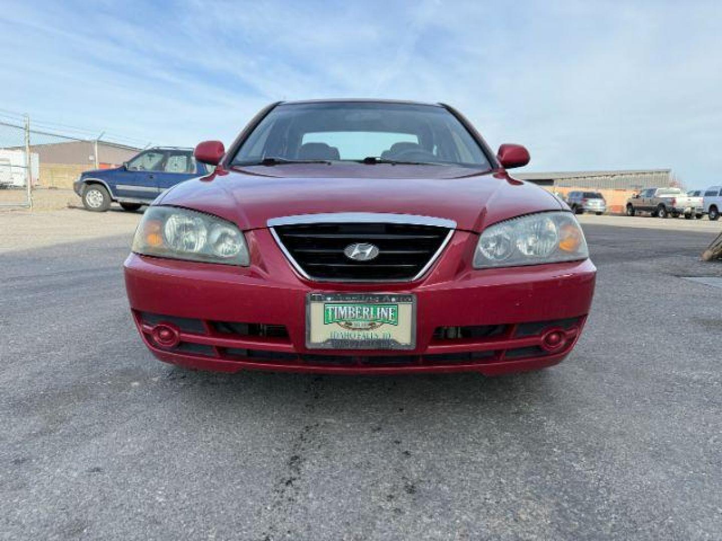 2004 RED /Gray Hyundai Elantra (KMHDN46D04U) with an 2L I-4 DOHC engine, Automatic transmission, located at 1175 N Woodruff Ave, Idaho Falls, ID, 83401, 43.506901, -111.999657 - At Timberline Auto, finding a great deal on your next vehicle is always easy! Our experienced sales staff's goal is to help find you the right vehicle at the right price! Our knowledgeable finance department has options for almost any credit score. We offer extended service contract options to prote - Photo#26
