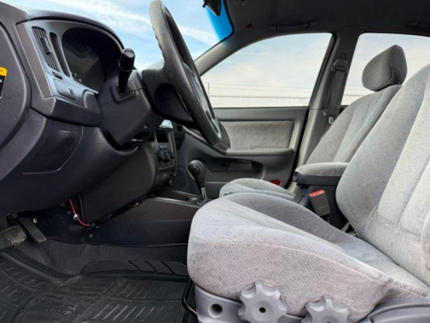 2004 RED /Gray Hyundai Elantra (KMHDN46D04U) with an 2L I-4 DOHC engine, Automatic transmission, located at 1175 N Woodruff Ave, Idaho Falls, ID, 83401, 43.506901, -111.999657 - At Timberline Auto, finding a great deal on your next vehicle is always easy! Our experienced sales staff's goal is to help find you the right vehicle at the right price! Our knowledgeable finance department has options for almost any credit score. We offer extended service contract options to prote - Photo#29