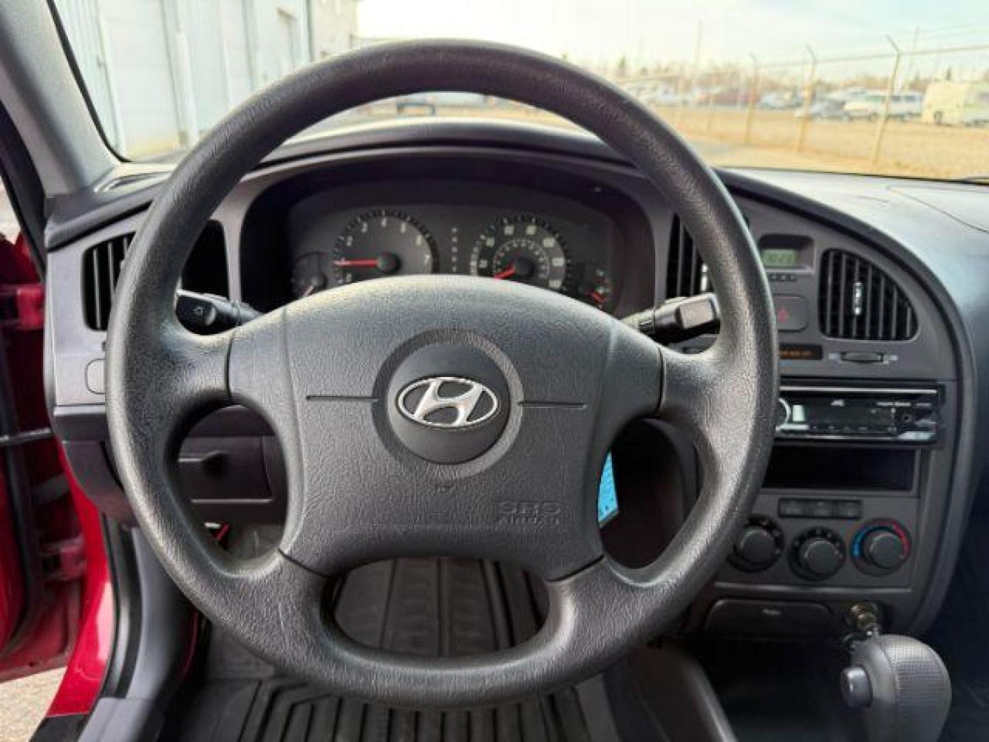 2004 RED /Gray Hyundai Elantra (KMHDN46D04U) with an 2L I-4 DOHC engine, Automatic transmission, located at 1175 N Woodruff Ave, Idaho Falls, ID, 83401, 43.506901, -111.999657 - At Timberline Auto, finding a great deal on your next vehicle is always easy! Our experienced sales staff's goal is to help find you the right vehicle at the right price! Our knowledgeable finance department has options for almost any credit score. We offer extended service contract options to prote - Photo#31