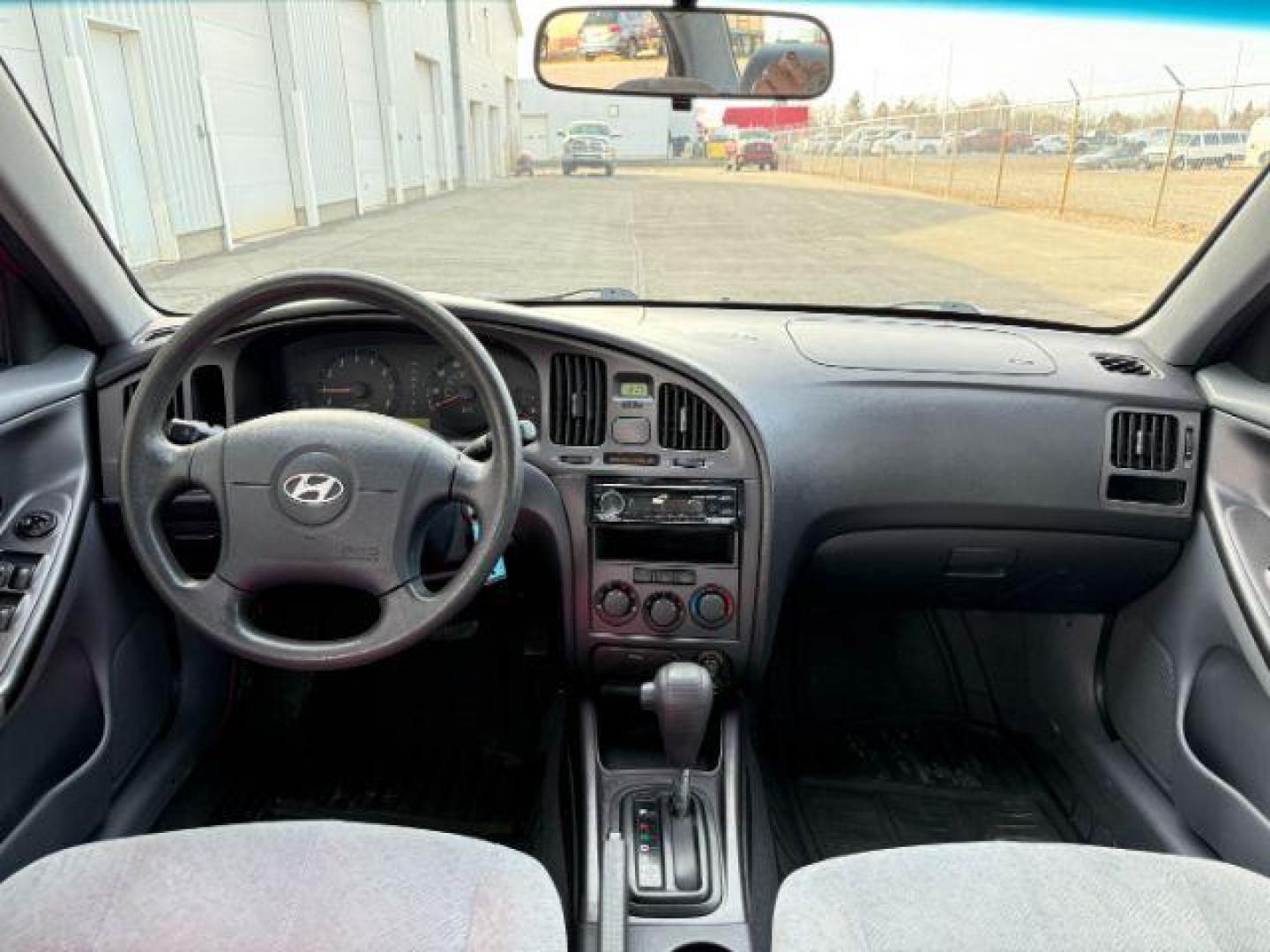 2004 RED /Gray Hyundai Elantra (KMHDN46D04U) with an 2L I-4 DOHC engine, Automatic transmission, located at 1175 N Woodruff Ave, Idaho Falls, ID, 83401, 43.506901, -111.999657 - At Timberline Auto, finding a great deal on your next vehicle is always easy! Our experienced sales staff's goal is to help find you the right vehicle at the right price! Our knowledgeable finance department has options for almost any credit score. We offer extended service contract options to prote - Photo#35