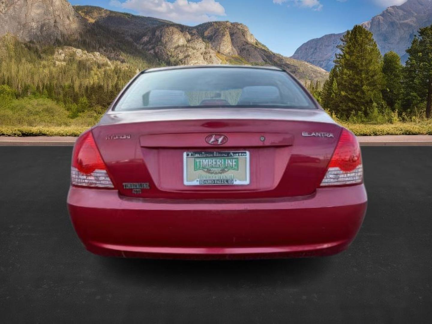 2004 RED /Gray Hyundai Elantra (KMHDN46D04U) with an 2L I-4 DOHC engine, Automatic transmission, located at 1175 N Woodruff Ave, Idaho Falls, ID, 83401, 43.506901, -111.999657 - At Timberline Auto, finding a great deal on your next vehicle is always easy! Our experienced sales staff's goal is to help find you the right vehicle at the right price! Our knowledgeable finance department has options for almost any credit score. We offer extended service contract options to prote - Photo#3