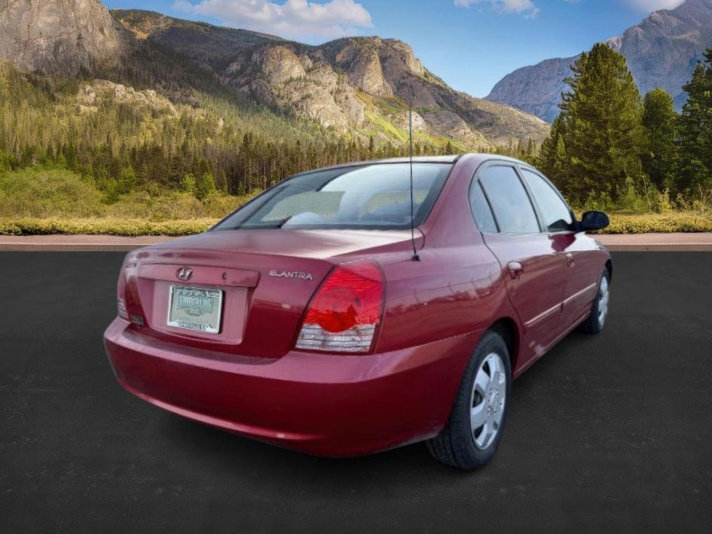 2004 RED /Gray Hyundai Elantra (KMHDN46D04U) with an 2L I-4 DOHC engine, Automatic transmission, located at 1175 N Woodruff Ave, Idaho Falls, ID, 83401, 43.506901, -111.999657 - At Timberline Auto, finding a great deal on your next vehicle is always easy! Our experienced sales staff's goal is to help find you the right vehicle at the right price! Our knowledgeable finance department has options for almost any credit score. We offer extended service contract options to prote - Photo#4