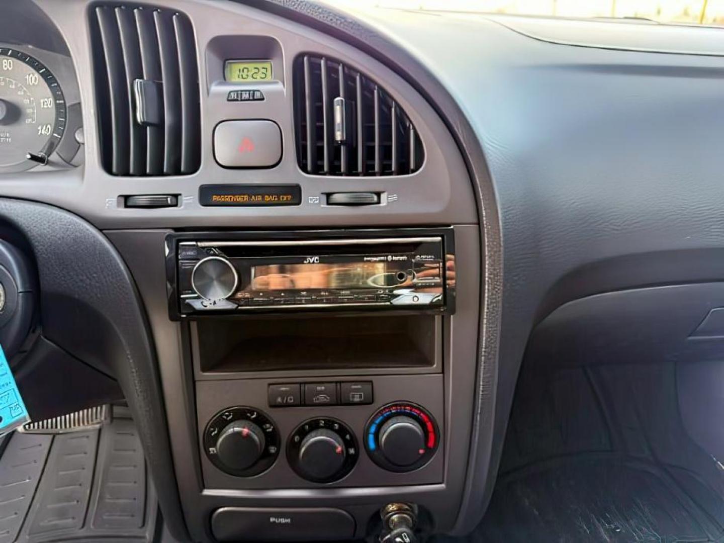 2004 RED /Gray Hyundai Elantra (KMHDN46D04U) with an 2L I-4 DOHC engine, Automatic transmission, located at 1175 N Woodruff Ave, Idaho Falls, ID, 83401, 43.506901, -111.999657 - At Timberline Auto, finding a great deal on your next vehicle is always easy! Our experienced sales staff's goal is to help find you the right vehicle at the right price! Our knowledgeable finance department has options for almost any credit score. We offer extended service contract options to prote - Photo#13