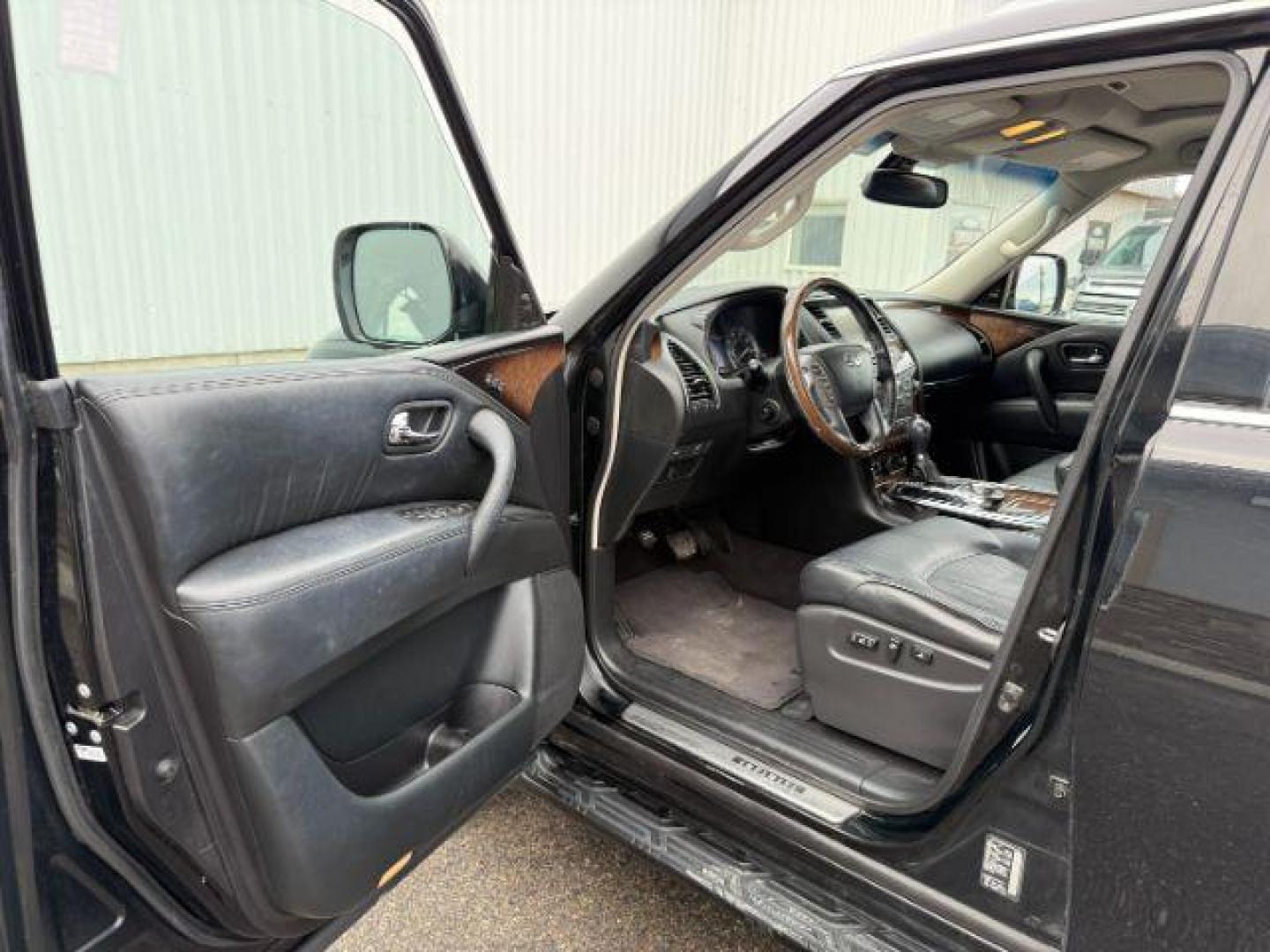 2013 BLACK /CLOTH Infiniti QX56 (JN8AZ2NEXD9) with an 56L V8 engine, Automatic transmission, located at 1175 N Woodruff Ave, Idaho Falls, ID, 83401, 43.506901, -111.999657 - Photo#44