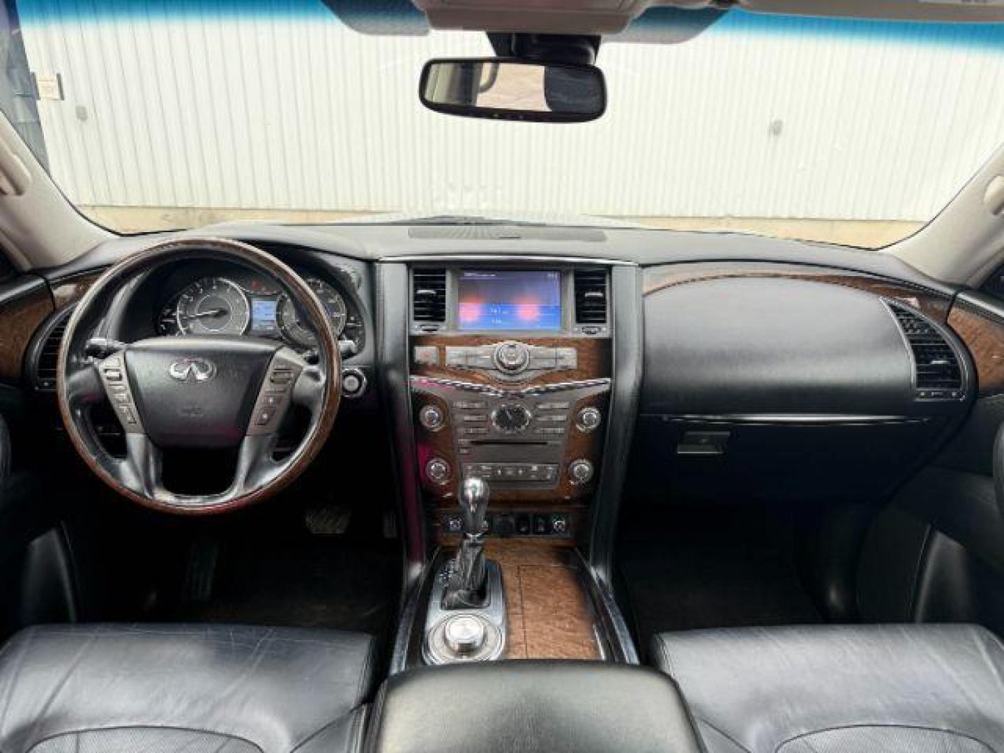 2013 BLACK /CLOTH Infiniti QX56 (JN8AZ2NEXD9) with an 56L V8 engine, Automatic transmission, located at 1175 N Woodruff Ave, Idaho Falls, ID, 83401, 43.506901, -111.999657 - Photo#56