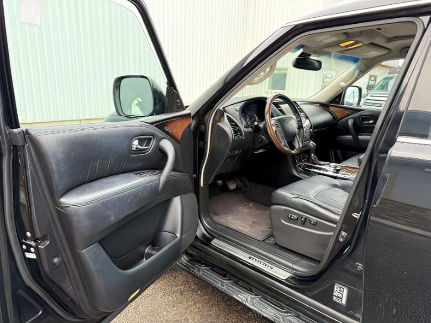 2013 BLACK /CLOTH Infiniti QX56 (JN8AZ2NEXD9) with an 56L V8 engine, Automatic transmission, located at 1175 N Woodruff Ave, Idaho Falls, ID, 83401, 43.506901, -111.999657 - Photo#14