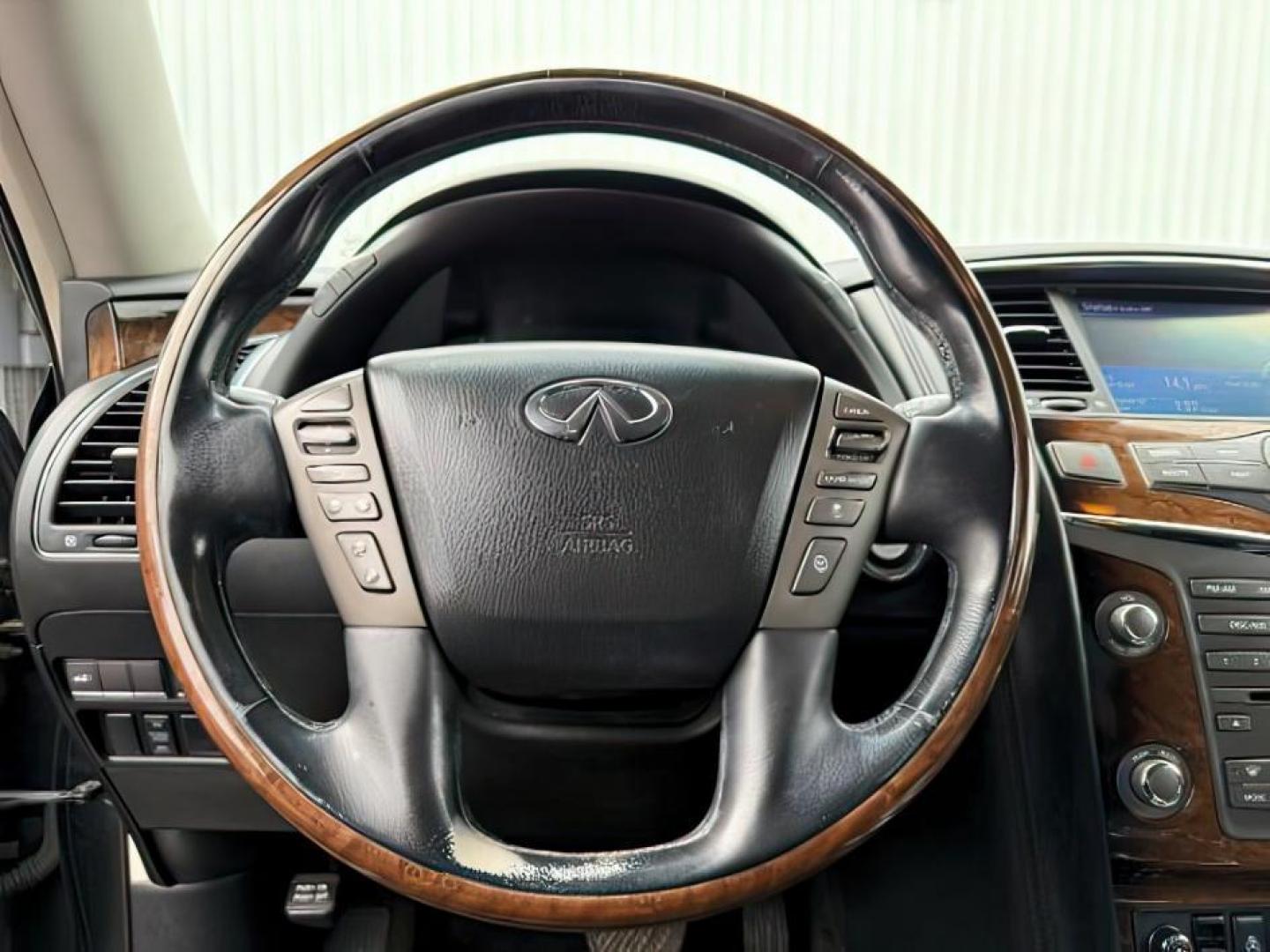 2013 BLACK /CLOTH Infiniti QX56 (JN8AZ2NEXD9) with an 56L V8 engine, Automatic transmission, located at 1175 N Woodruff Ave, Idaho Falls, ID, 83401, 43.506901, -111.999657 - Photo#17