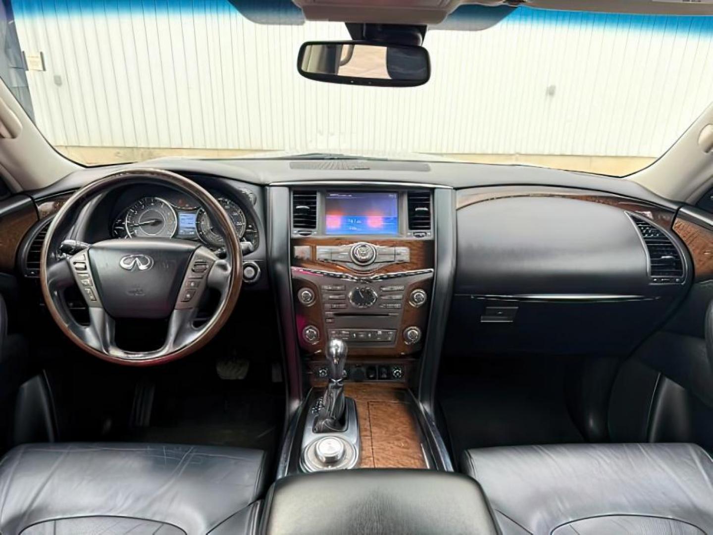 2013 BLACK /CLOTH Infiniti QX56 (JN8AZ2NEXD9) with an 56L V8 engine, Automatic transmission, located at 1175 N Woodruff Ave, Idaho Falls, ID, 83401, 43.506901, -111.999657 - Photo#26