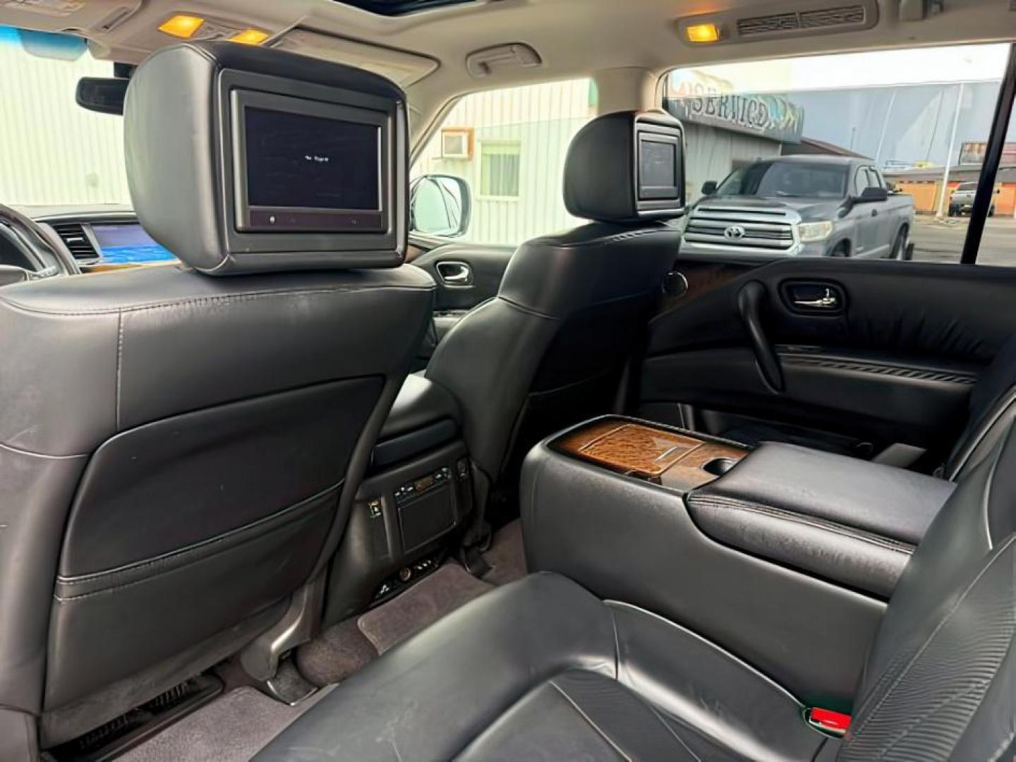 2013 BLACK /CLOTH Infiniti QX56 (JN8AZ2NEXD9) with an 56L V8 engine, Automatic transmission, located at 1175 N Woodruff Ave, Idaho Falls, ID, 83401, 43.506901, -111.999657 - Photo#28