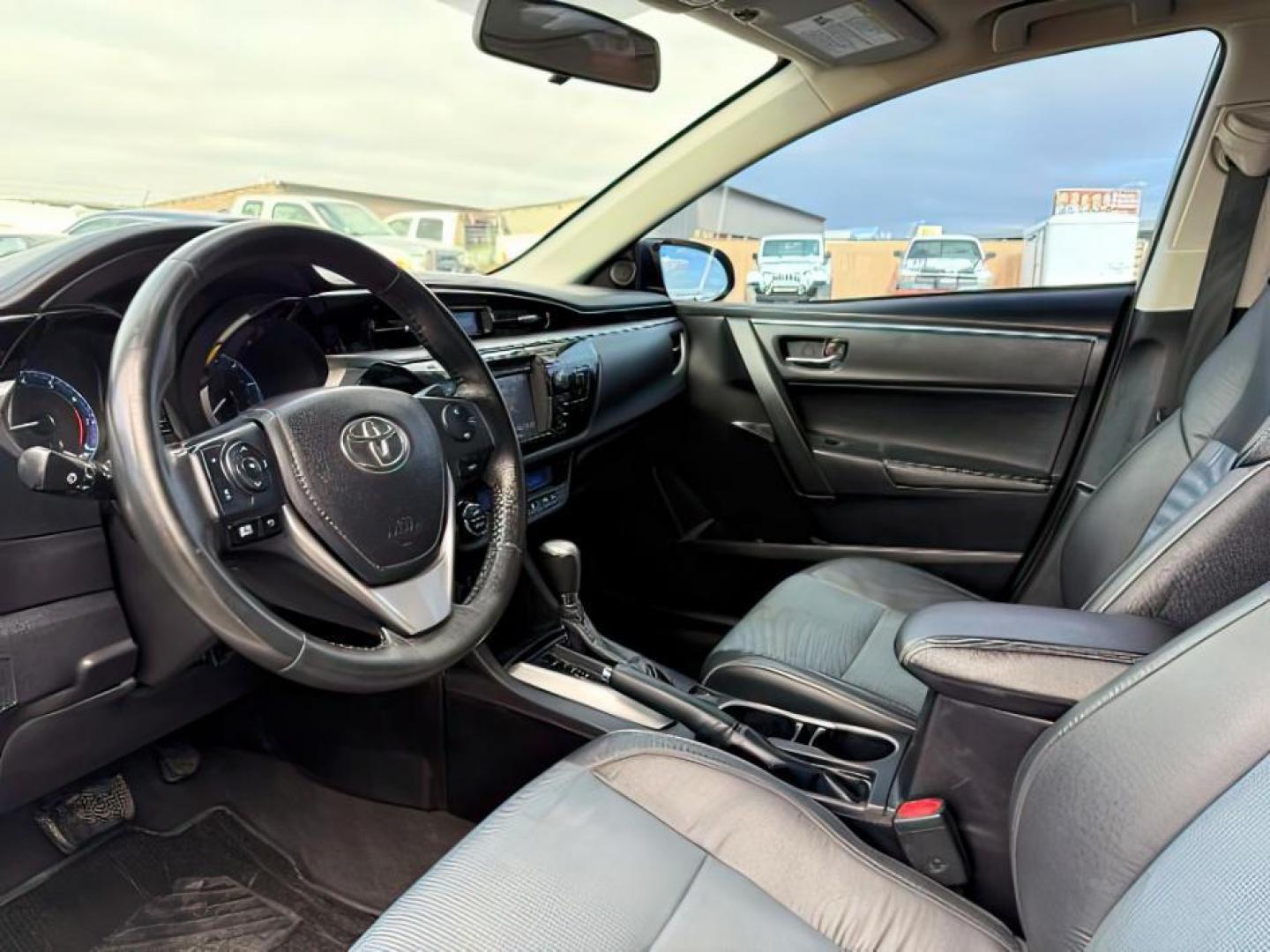 2014 Super White /Black Toyota Corolla (2T1BURHEXEC) with an 18L I-4 DOHC engine, Automatic transmission, located at 1175 N Woodruff Ave, Idaho Falls, ID, 83401, 43.506901, -111.999657 - At Timberline Auto, finding a great deal on your next vehicle is always easy! Our experienced sales staff's goal is to help find you the right vehicle at the right price! Our knowledgeable finance department has options for almost any credit score. We offer extended service contract options to prote - Photo#12