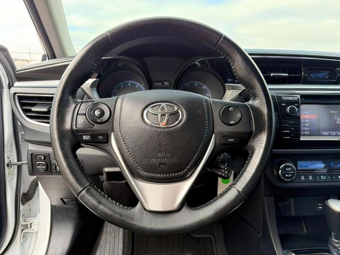 2014 Super White /Black Toyota Corolla (2T1BURHEXEC) with an 18L I-4 DOHC engine, Automatic transmission, located at 1175 N Woodruff Ave, Idaho Falls, ID, 83401, 43.506901, -111.999657 - At Timberline Auto, finding a great deal on your next vehicle is always easy! Our experienced sales staff's goal is to help find you the right vehicle at the right price! Our knowledgeable finance department has options for almost any credit score. We offer extended service contract options to prote - Photo#13