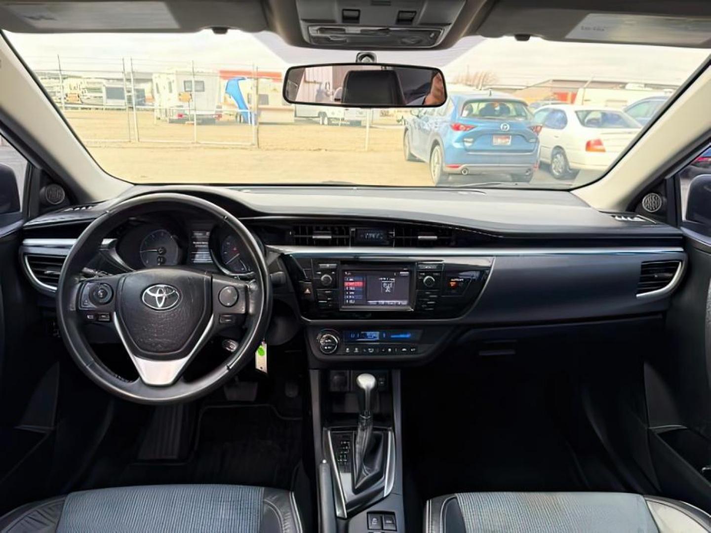 2014 Super White /Black Toyota Corolla (2T1BURHEXEC) with an 18L I-4 DOHC engine, Automatic transmission, located at 1175 N Woodruff Ave, Idaho Falls, ID, 83401, 43.506901, -111.999657 - At Timberline Auto, finding a great deal on your next vehicle is always easy! Our experienced sales staff's goal is to help find you the right vehicle at the right price! Our knowledgeable finance department has options for almost any credit score. We offer extended service contract options to prote - Photo#19