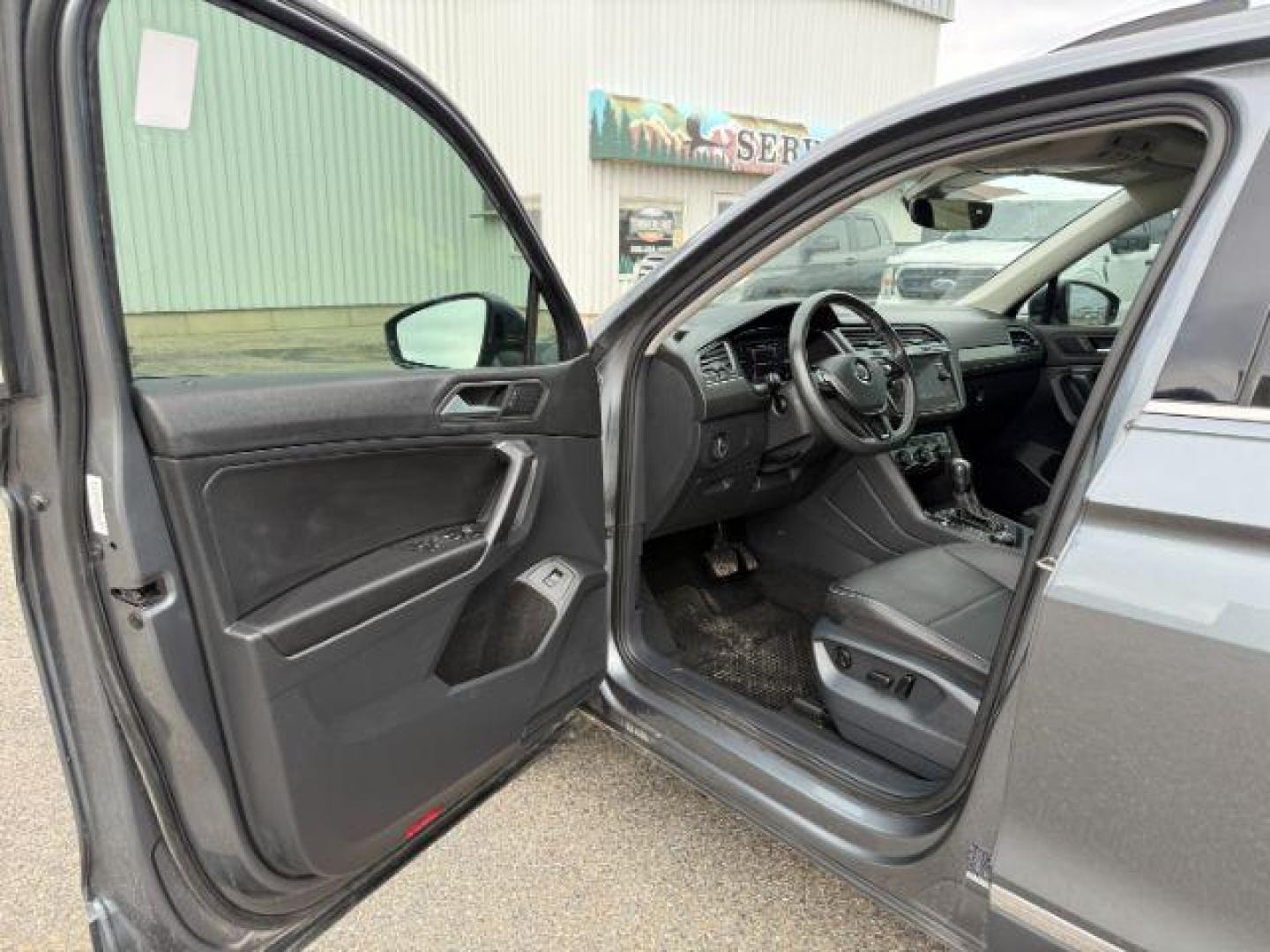 2021 GRAY /Titan Black Volkswagen Tiguan (3VV2B7AX1MM) with an 2L I-4 gasoline direct injection engine, Automatic transmission, located at 1175 N Woodruff Ave, Idaho Falls, ID, 83401, 43.506901, -111.999657 - At Timberline Auto, finding a great deal on your next vehicle is always easy! Our experienced sales staff's goal is to help find you the right vehicle at the right price! Our knowledgeable finance department has options for almost any credit score. We offer extended service contract options to prote - Photo#42