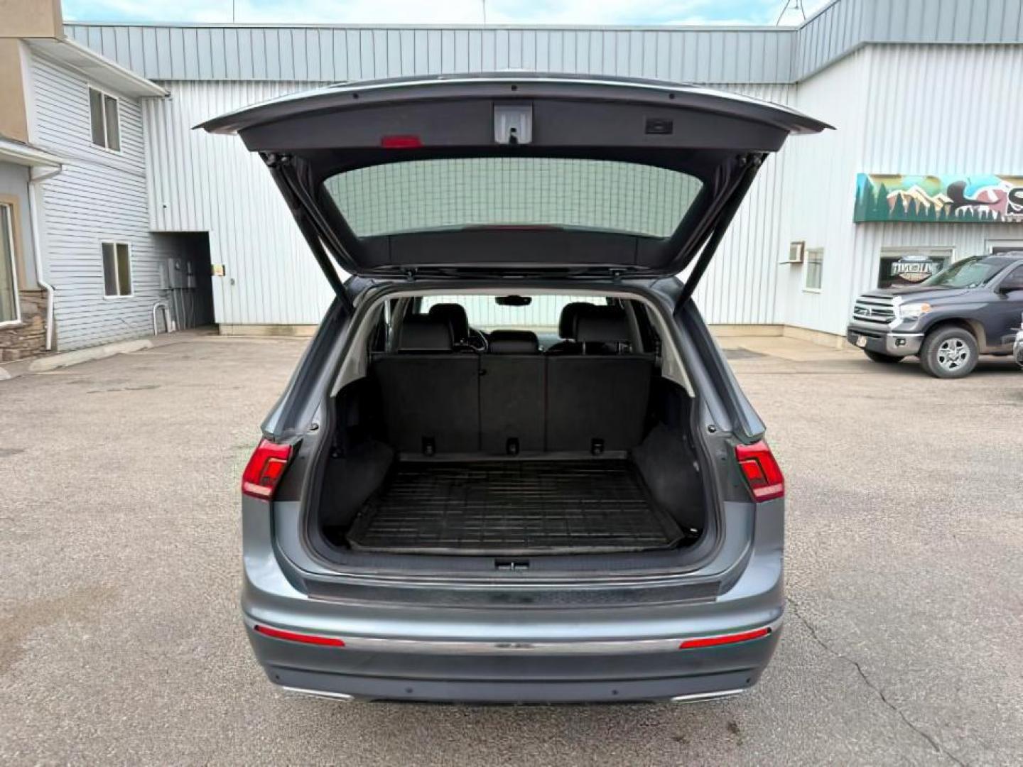 2021 GRAY /Titan Black Volkswagen Tiguan (3VV2B7AX1MM) with an 2L I-4 gasoline direct injection engine, Automatic transmission, located at 1175 N Woodruff Ave, Idaho Falls, ID, 83401, 43.506901, -111.999657 - At Timberline Auto, finding a great deal on your next vehicle is always easy! Our experienced sales staff's goal is to help find you the right vehicle at the right price! Our knowledgeable finance department has options for almost any credit score. We offer extended service contract options to prote - Photo#5