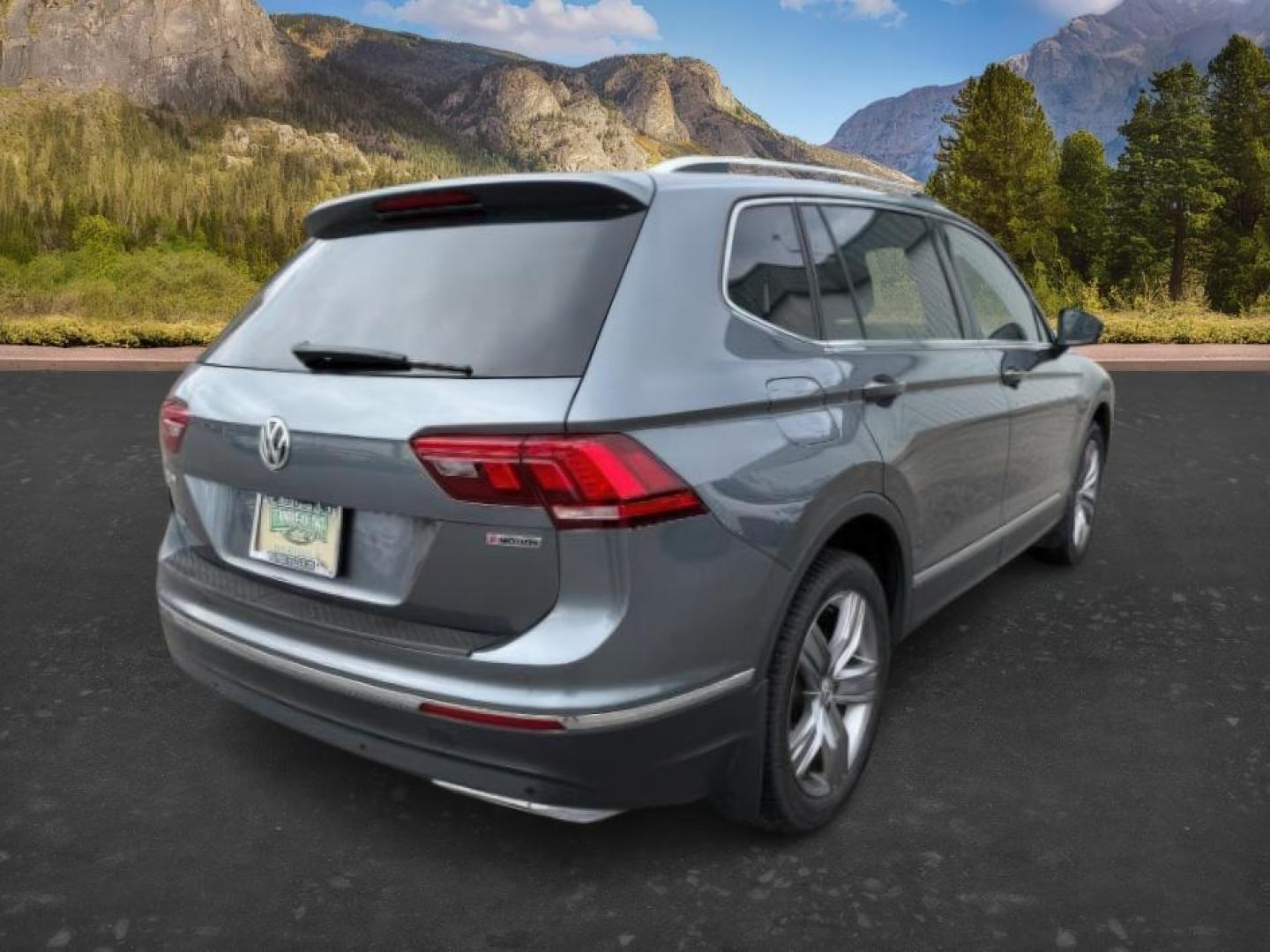 2021 GRAY /Titan Black Volkswagen Tiguan (3VV2B7AX1MM) with an 2L I-4 gasoline direct injection engine, Automatic transmission, located at 1175 N Woodruff Ave, Idaho Falls, ID, 83401, 43.506901, -111.999657 - At Timberline Auto, finding a great deal on your next vehicle is always easy! Our experienced sales staff's goal is to help find you the right vehicle at the right price! Our knowledgeable finance department has options for almost any credit score. We offer extended service contract options to prote - Photo#8