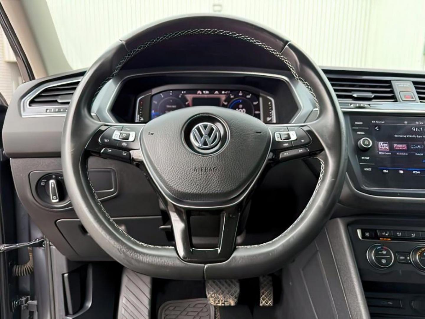 2021 GRAY /Titan Black Volkswagen Tiguan (3VV2B7AX1MM) with an 2L I-4 gasoline direct injection engine, Automatic transmission, located at 1175 N Woodruff Ave, Idaho Falls, ID, 83401, 43.506901, -111.999657 - At Timberline Auto, finding a great deal on your next vehicle is always easy! Our experienced sales staff's goal is to help find you the right vehicle at the right price! Our knowledgeable finance department has options for almost any credit score. We offer extended service contract options to prote - Photo#17