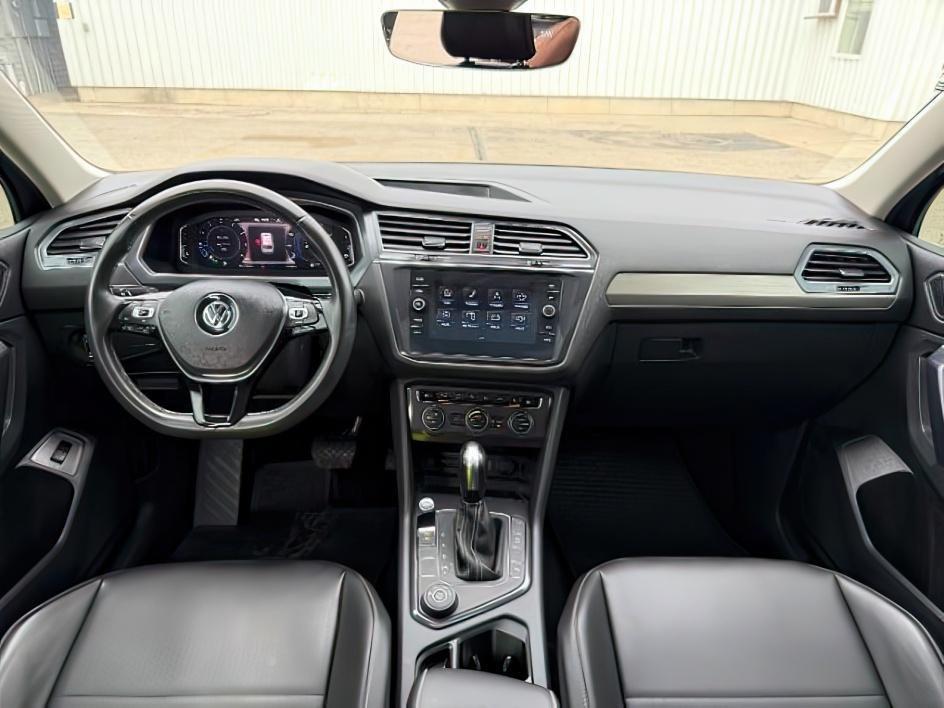 2021 GRAY /Titan Black Volkswagen Tiguan 2.0T SEL (3VV2B7AX1MM) with an 2L I-4 gasoline direct injection engine, AUTOMATIC transmission, located at 1235 N Woodruff Ave., Idaho Falls, 83401, (208) 523-1053, 43.507172, -112.000488- Photo#25