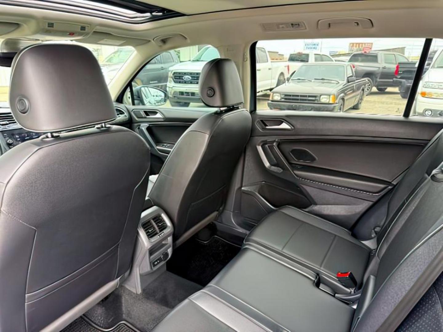 2021 GRAY /Titan Black Volkswagen Tiguan (3VV2B7AX1MM) with an 2L I-4 gasoline direct injection engine, Automatic transmission, located at 1175 N Woodruff Ave, Idaho Falls, ID, 83401, 43.506901, -111.999657 - At Timberline Auto, finding a great deal on your next vehicle is always easy! Our experienced sales staff's goal is to help find you the right vehicle at the right price! Our knowledgeable finance department has options for almost any credit score. We offer extended service contract options to prote - Photo#26