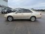 2005 GOLD /CLOTH Toyota Camry (4T1BF30K45U) with an 30L V6 engine, Automatic transmission, located at 1175 N Woodruff Ave, Idaho Falls, ID, 83401, 43.506901, -111.999657 - At Timberline Auto, finding a great deal on your next vehicle is always easy! Our experienced sales staff's goal is to help find you the right vehicle at the right price! Our knowledgeable finance department has options for almost any credit score. We offer extended service contract options to prote - Photo#23