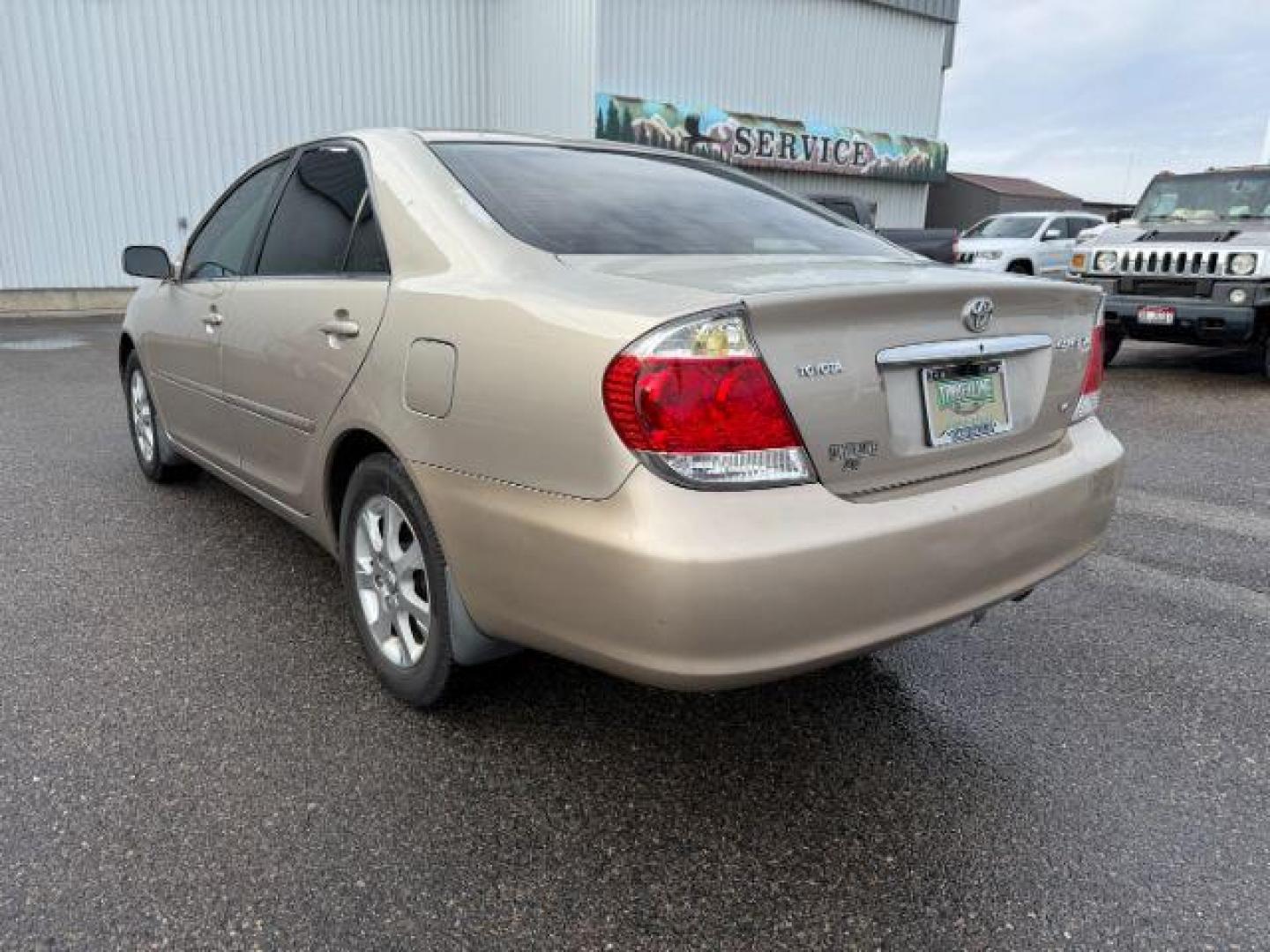 2005 GOLD /CLOTH Toyota Camry (4T1BF30K45U) with an 30L V6 engine, Automatic transmission, located at 1175 N Woodruff Ave, Idaho Falls, ID, 83401, 43.506901, -111.999657 - At Timberline Auto, finding a great deal on your next vehicle is always easy! Our experienced sales staff's goal is to help find you the right vehicle at the right price! Our knowledgeable finance department has options for almost any credit score. We offer extended service contract options to prote - Photo#24