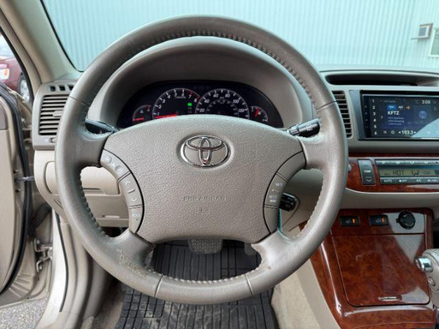 2005 GOLD /CLOTH Toyota Camry (4T1BF30K45U) with an 30L V6 engine, Automatic transmission, located at 1175 N Woodruff Ave, Idaho Falls, ID, 83401, 43.506901, -111.999657 - At Timberline Auto, finding a great deal on your next vehicle is always easy! Our experienced sales staff's goal is to help find you the right vehicle at the right price! Our knowledgeable finance department has options for almost any credit score. We offer extended service contract options to prote - Photo#34