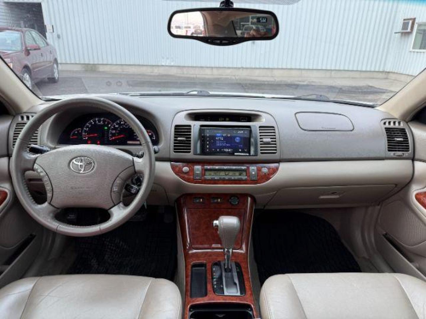 2005 GOLD /CLOTH Toyota Camry (4T1BF30K45U) with an 30L V6 engine, Automatic transmission, located at 1175 N Woodruff Ave, Idaho Falls, ID, 83401, 43.506901, -111.999657 - At Timberline Auto, finding a great deal on your next vehicle is always easy! Our experienced sales staff's goal is to help find you the right vehicle at the right price! Our knowledgeable finance department has options for almost any credit score. We offer extended service contract options to prote - Photo#41