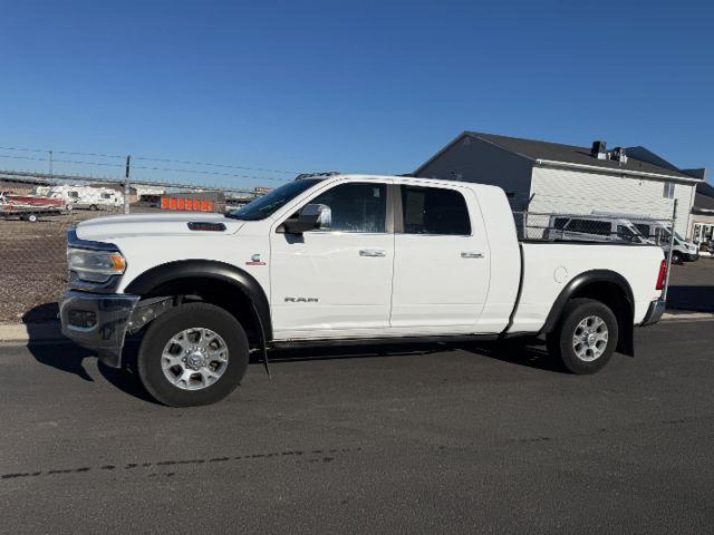 2019 WHITE /Black Ram 3500 (3C63R3ML1KG) with an Cummins 67L I-6 diesel direct injection engine, Automatic transmission, located at 1175 N Woodruff Ave, Idaho Falls, ID, 83401, 43.506901, -111.999657 - At Timberline Auto, finding a great deal on your next vehicle is always easy! Our experienced sales staff's goal is to help find you the right vehicle at the right price! Our knowledgeable finance department has options for almost any credit score. We offer extended service contract options to prote - Photo#1