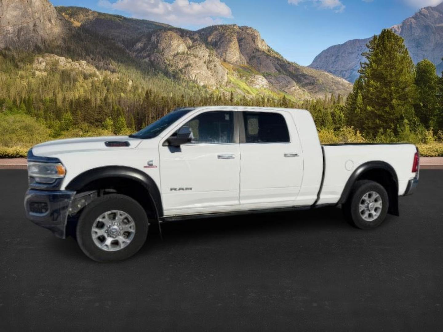 2019 WHITE /Black Ram 3500 (3C63R3ML1KG) with an Cummins 67L I-6 diesel direct injection engine, Automatic transmission, located at 1175 N Woodruff Ave, Idaho Falls, ID, 83401, 43.506901, -111.999657 - At Timberline Auto, finding a great deal on your next vehicle is always easy! Our experienced sales staff's goal is to help find you the right vehicle at the right price! Our knowledgeable finance department has options for almost any credit score. We offer extended service contract options to prote - Photo#0