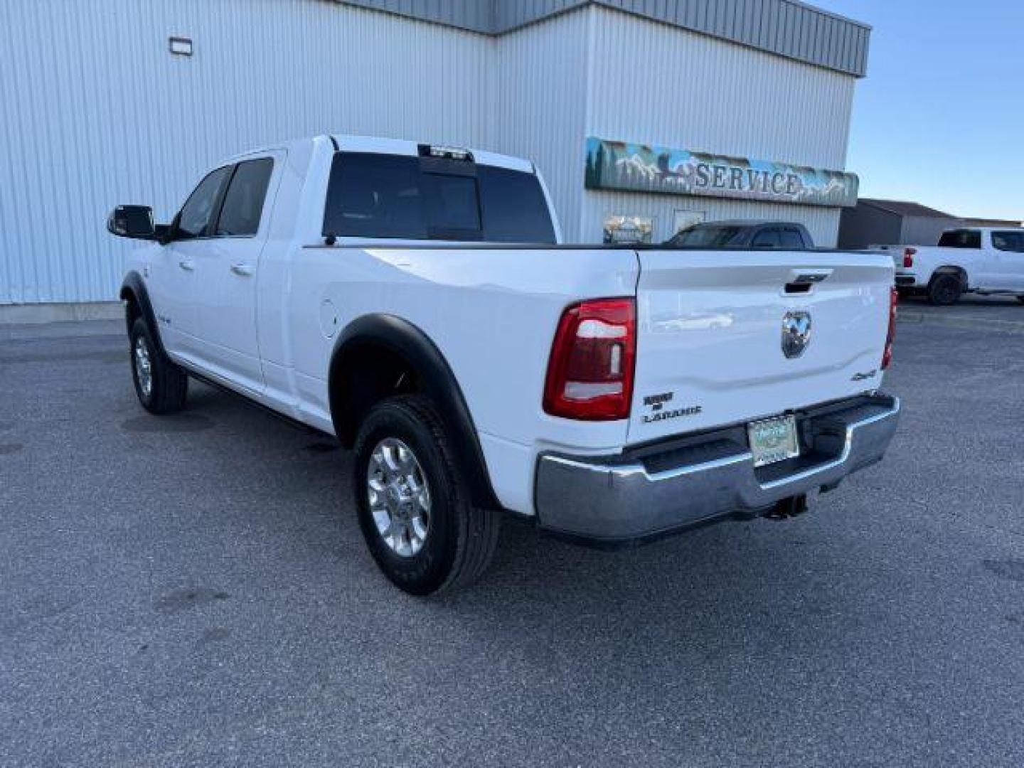 2019 WHITE /Black Ram 3500 (3C63R3ML1KG) with an Cummins 67L I-6 diesel direct injection engine, Automatic transmission, located at 1175 N Woodruff Ave, Idaho Falls, ID, 83401, 43.506901, -111.999657 - At Timberline Auto, finding a great deal on your next vehicle is always easy! Our experienced sales staff's goal is to help find you the right vehicle at the right price! Our knowledgeable finance department has options for almost any credit score. We offer extended service contract options to prote - Photo#30