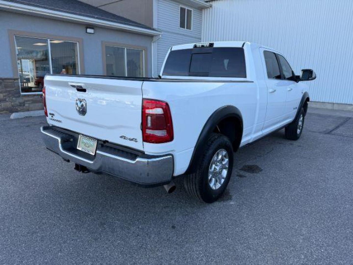 2019 WHITE /Black Ram 3500 (3C63R3ML1KG) with an Cummins 67L I-6 diesel direct injection engine, Automatic transmission, located at 1175 N Woodruff Ave, Idaho Falls, ID, 83401, 43.506901, -111.999657 - At Timberline Auto, finding a great deal on your next vehicle is always easy! Our experienced sales staff's goal is to help find you the right vehicle at the right price! Our knowledgeable finance department has options for almost any credit score. We offer extended service contract options to prote - Photo#34