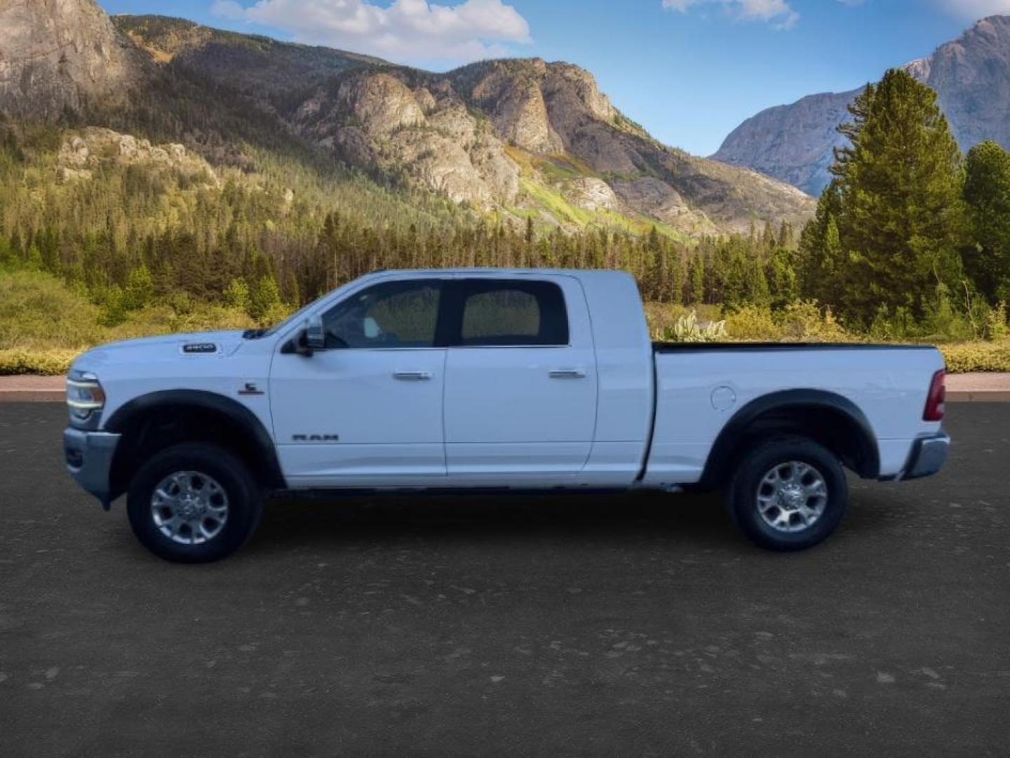 2019 WHITE /Black Ram 3500 (3C63R3ML1KG) with an Cummins 67L I-6 diesel direct injection engine, Automatic transmission, located at 1175 N Woodruff Ave, Idaho Falls, ID, 83401, 43.506901, -111.999657 - At Timberline Auto, finding a great deal on your next vehicle is always easy! Our experienced sales staff's goal is to help find you the right vehicle at the right price! Our knowledgeable finance department has options for almost any credit score. We offer extended service contract options to prote - Photo#1