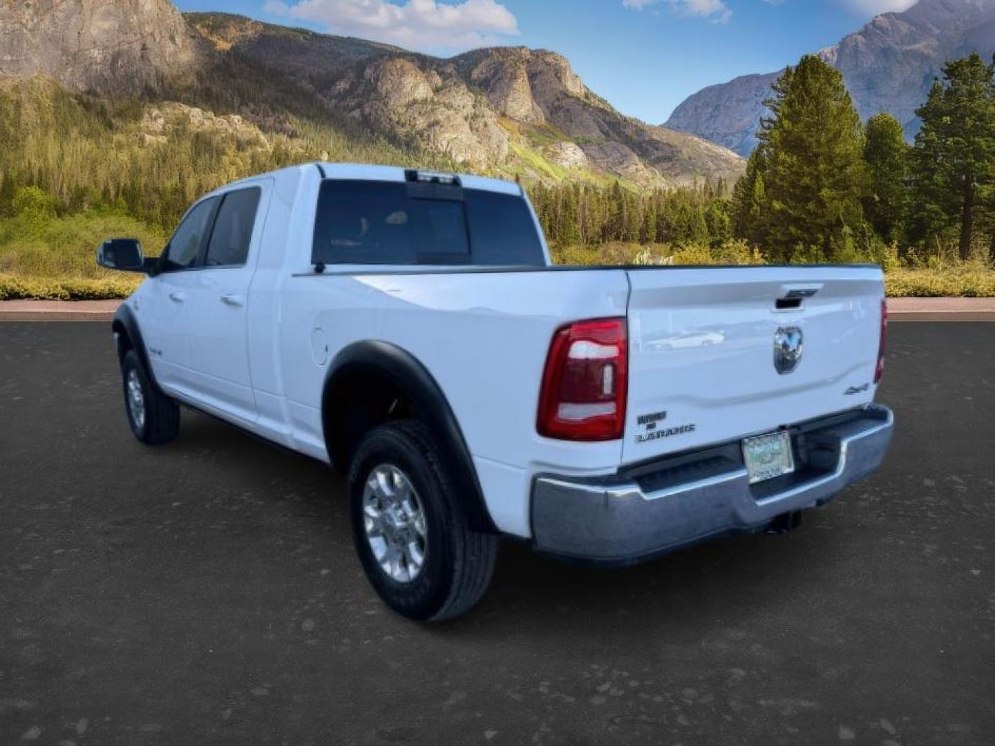 2019 WHITE /Black Ram 3500 (3C63R3ML1KG) with an Cummins 67L I-6 diesel direct injection engine, Automatic transmission, located at 1175 N Woodruff Ave, Idaho Falls, ID, 83401, 43.506901, -111.999657 - At Timberline Auto, finding a great deal on your next vehicle is always easy! Our experienced sales staff's goal is to help find you the right vehicle at the right price! Our knowledgeable finance department has options for almost any credit score. We offer extended service contract options to prote - Photo#2
