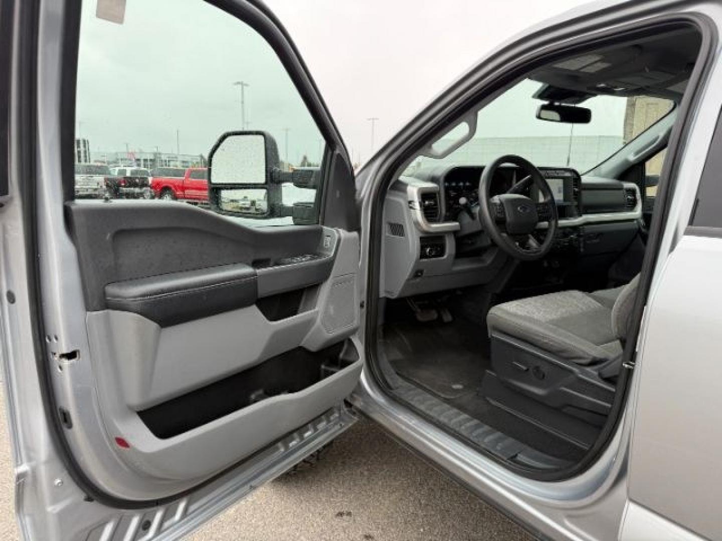 2023 SILVER /Medium Dark Slate Ford F-250 (1FT7W2BN9PE) with an 73L V-8 DEVCT variable valve control engine, Automatic transmission, located at 1175 N Woodruff Ave, Idaho Falls, ID, 83401, 43.506901, -111.999657 - At Timberline Auto, finding a great deal on your next vehicle is always easy! Our experienced sales staff's goal is to help find you the right vehicle at the right price! Our knowledgeable finance department has options for almost any credit score. We offer extended service contract options to prote - Photo#40