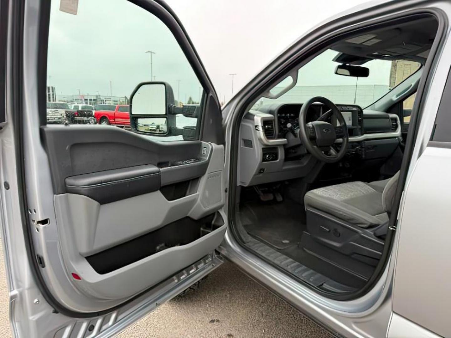 2023 SILVER /Medium Dark Slate Ford F-250 (1FT7W2BN9PE) with an 73L V-8 DEVCT variable valve control engine, Automatic transmission, located at 1175 N Woodruff Ave, Idaho Falls, ID, 83401, 43.506901, -111.999657 - At Timberline Auto, finding a great deal on your next vehicle is always easy! Our experienced sales staff's goal is to help find you the right vehicle at the right price! Our knowledgeable finance department has options for almost any credit score. We offer extended service contract options to prote - Photo#12