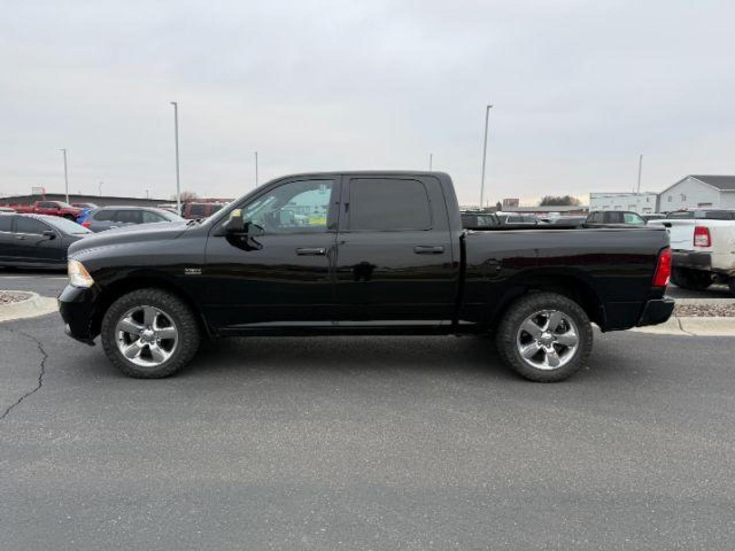 2012 Black Clearcoat /Medium Greystone/Dark Slate Ram 1500 (1C6RD7KT7CS) with an HEMI 57L V-8 variable valve control engine, Automatic transmission, located at 1175 N Woodruff Ave, Idaho Falls, ID, 83401, 43.506901, -111.999657 - Photo#1