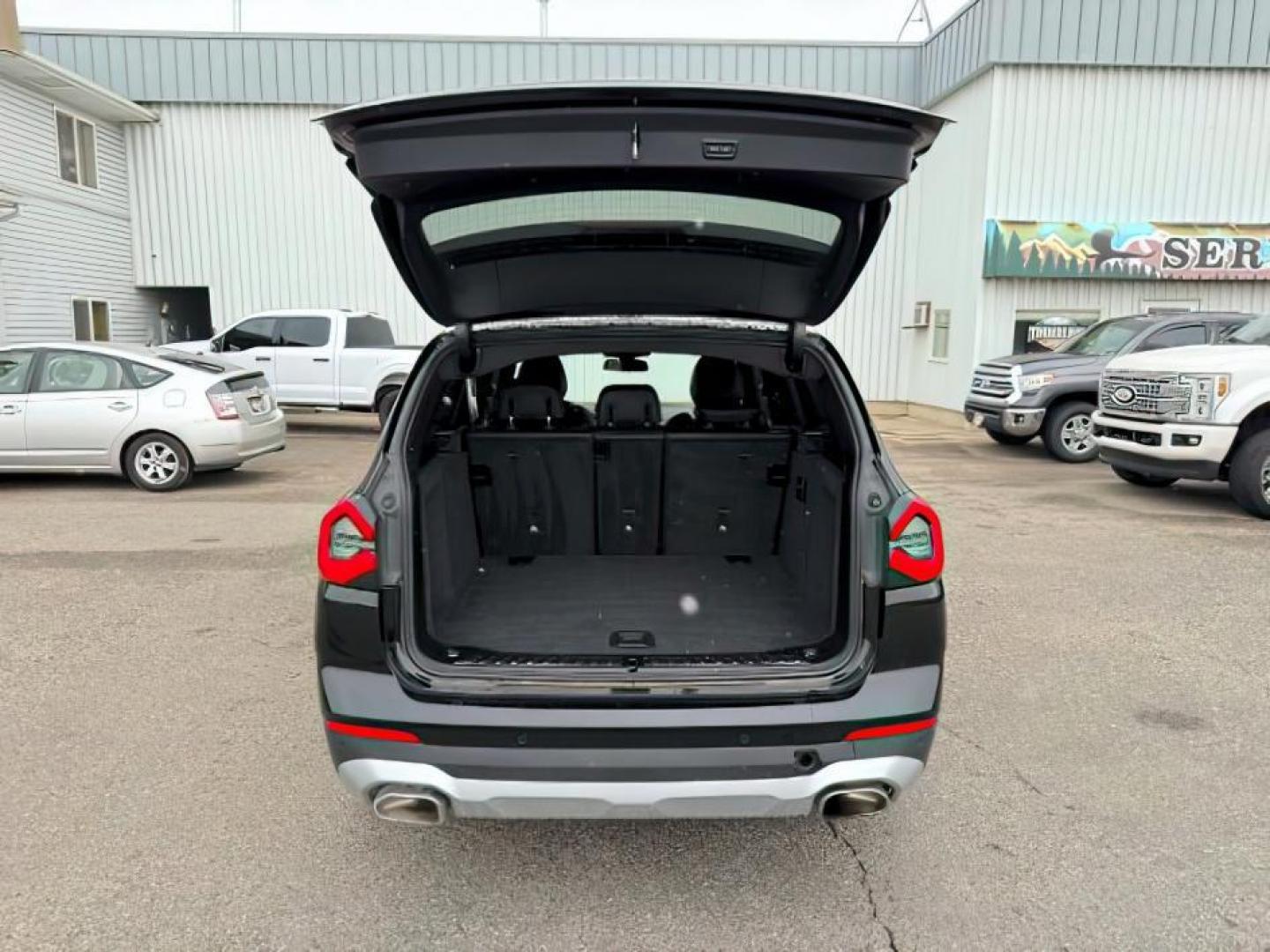 2024 BLACK /Black BMW X3 (5UX53DP00R9) with an 2L I-4 gasoline direct injection engine, Automatic transmission, located at 1175 N Woodruff Ave, Idaho Falls, ID, 83401, 43.506901, -111.999657 - At Timberline Auto, finding a great deal on your next vehicle is always easy! Our experienced sales staff's goal is to help find you the right vehicle at the right price! Our knowledgeable finance department has options for almost any credit score. We offer extended service contract options to prote - Photo#5