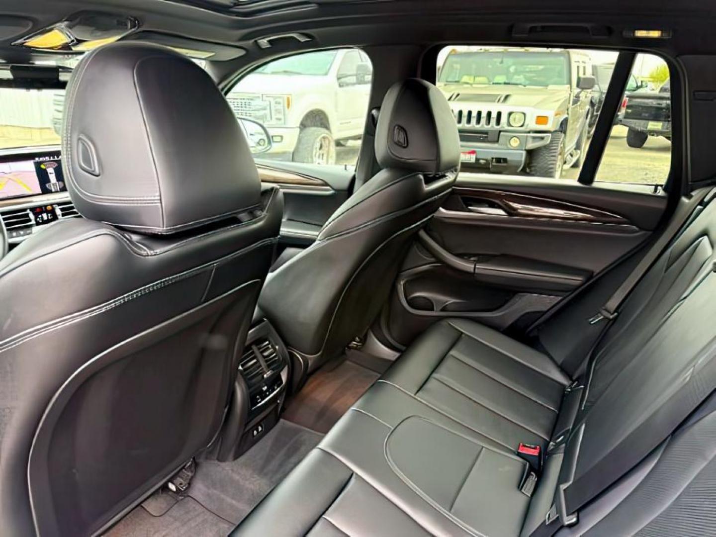 2024 BLACK /Black BMW X3 (5UX53DP00R9) with an 2L I-4 gasoline direct injection engine, Automatic transmission, located at 1175 N Woodruff Ave, Idaho Falls, ID, 83401, 43.506901, -111.999657 - At Timberline Auto, finding a great deal on your next vehicle is always easy! Our experienced sales staff's goal is to help find you the right vehicle at the right price! Our knowledgeable finance department has options for almost any credit score. We offer extended service contract options to prote - Photo#27