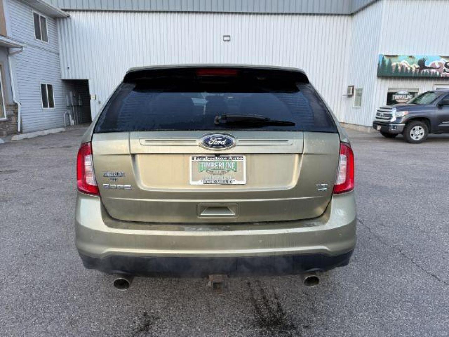 2013 GREEN /Charcoal Black Ford Edge (2FMDK4JC6DB) with an 35L V-6 DOHC engine, Automatic transmission, located at 1175 N Woodruff Ave, Idaho Falls, ID, 83401, 43.506901, -111.999657 - At Timberline Auto, finding a great deal on your next vehicle is always easy! Our experienced sales staff's goal is to help find you the right vehicle at the right price! Our knowledgeable finance department has options for almost any credit score. We offer extended service contract options to prote - Photo#28