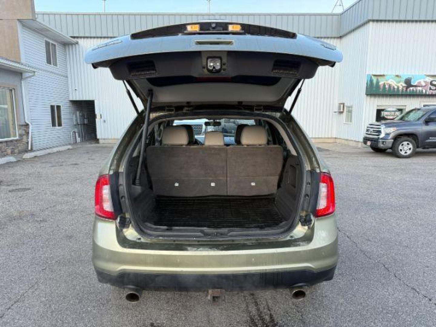 2013 GREEN /Charcoal Black Ford Edge (2FMDK4JC6DB) with an 35L V-6 DOHC engine, Automatic transmission, located at 1175 N Woodruff Ave, Idaho Falls, ID, 83401, 43.506901, -111.999657 - At Timberline Auto, finding a great deal on your next vehicle is always easy! Our experienced sales staff's goal is to help find you the right vehicle at the right price! Our knowledgeable finance department has options for almost any credit score. We offer extended service contract options to prote - Photo#30
