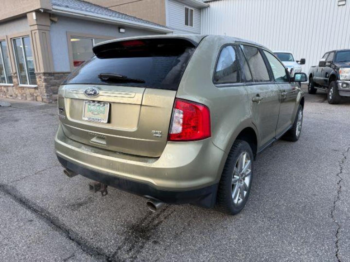 2013 GREEN /Charcoal Black Ford Edge (2FMDK4JC6DB) with an 35L V-6 DOHC engine, Automatic transmission, located at 1175 N Woodruff Ave, Idaho Falls, ID, 83401, 43.506901, -111.999657 - At Timberline Auto, finding a great deal on your next vehicle is always easy! Our experienced sales staff's goal is to help find you the right vehicle at the right price! Our knowledgeable finance department has options for almost any credit score. We offer extended service contract options to prote - Photo#34
