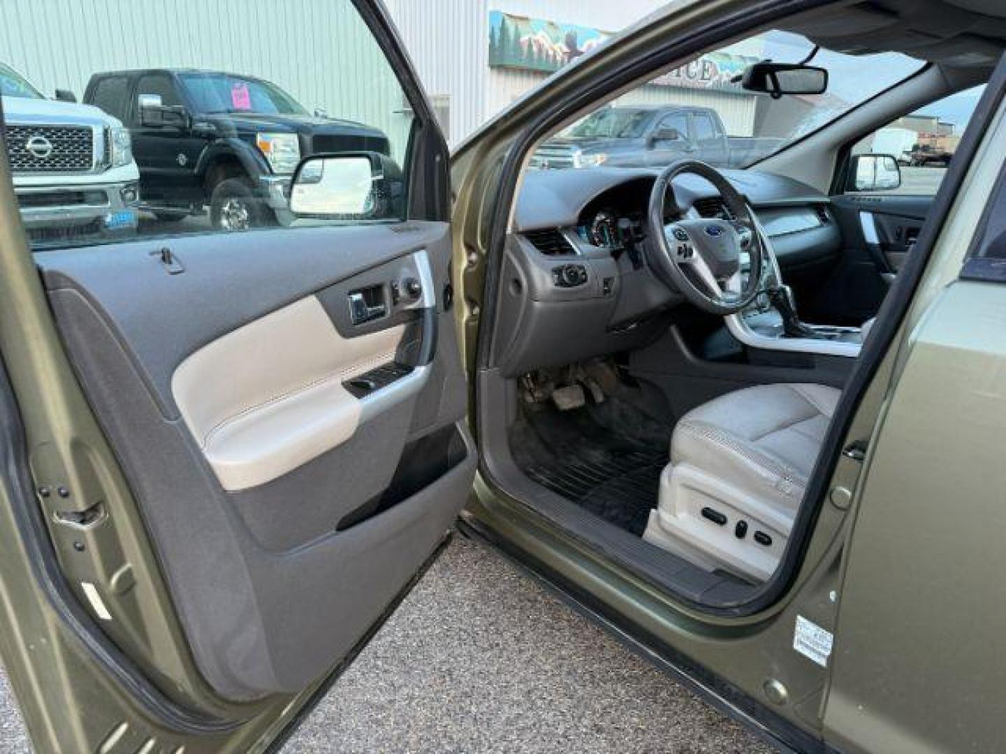 2013 GREEN /Charcoal Black Ford Edge (2FMDK4JC6DB) with an 35L V-6 DOHC engine, Automatic transmission, located at 1175 N Woodruff Ave, Idaho Falls, ID, 83401, 43.506901, -111.999657 - At Timberline Auto, finding a great deal on your next vehicle is always easy! Our experienced sales staff's goal is to help find you the right vehicle at the right price! Our knowledgeable finance department has options for almost any credit score. We offer extended service contract options to prote - Photo#39